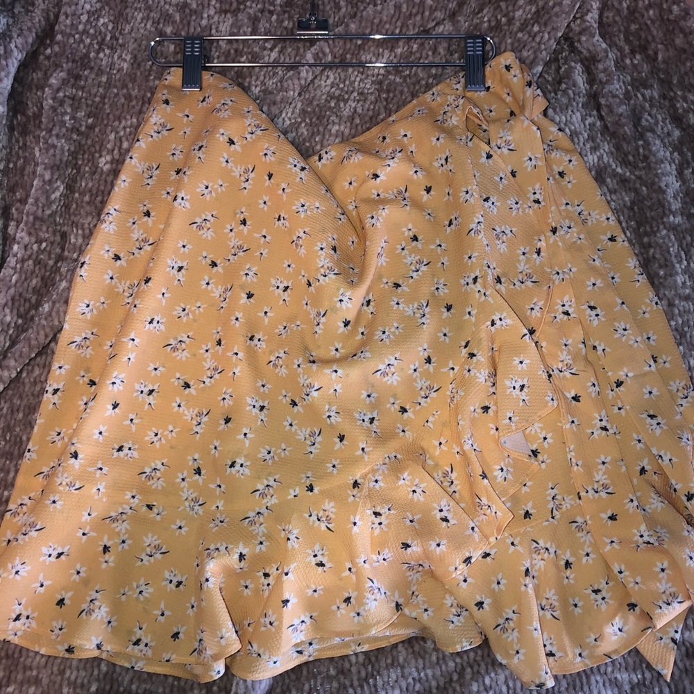 A yellow mini skirt